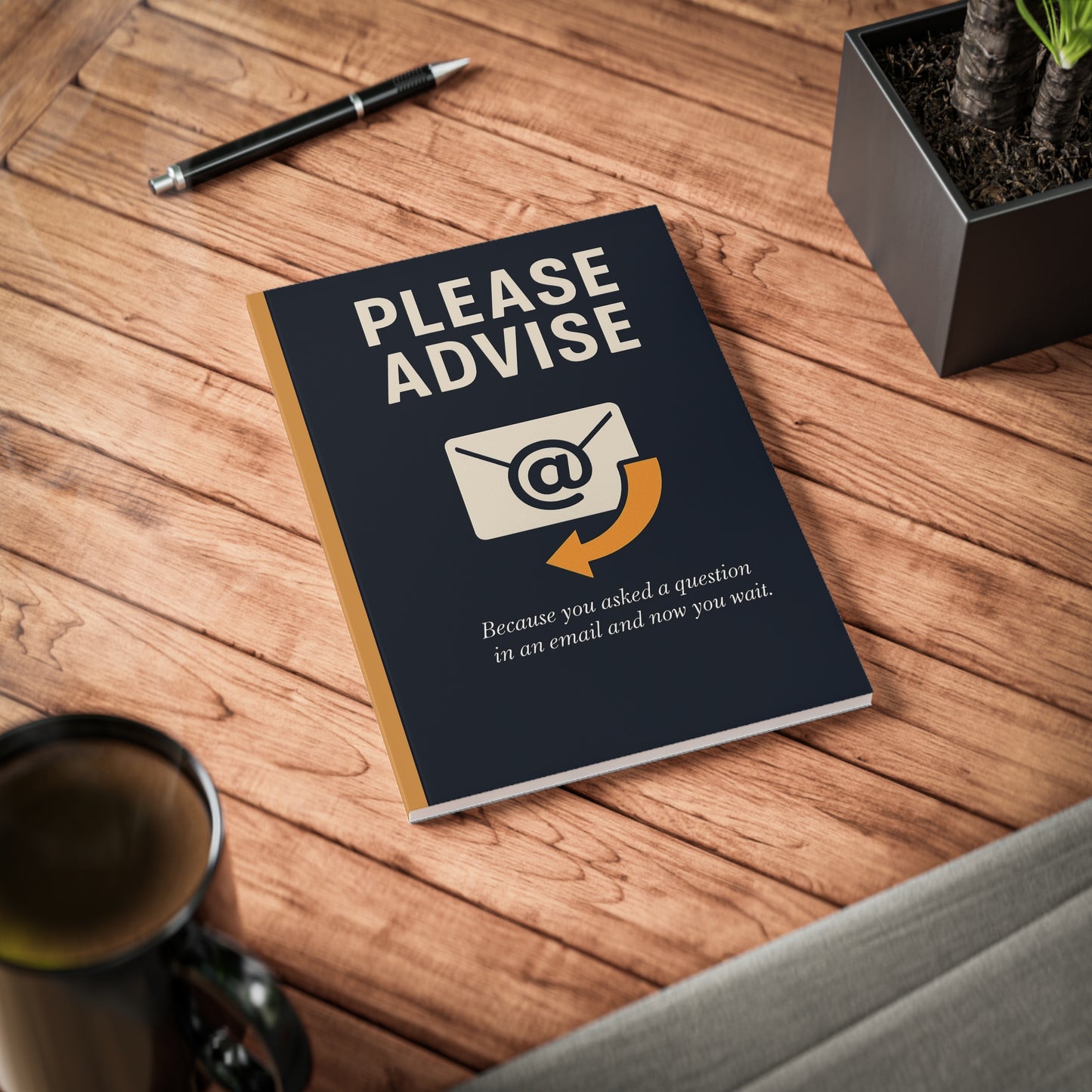 A5 notebook with the text “Please Advise” above an email icon, featuring the tagline “Because you asked a question in an email and now you wait” — ideal for corporate humor and office stationery.