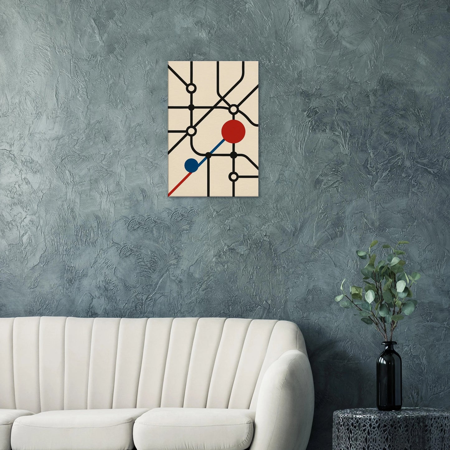 Minimalist abstract canvas wall art inspired by the London Underground, featuring bold black lines with red and blue geometric circles on a beige background.